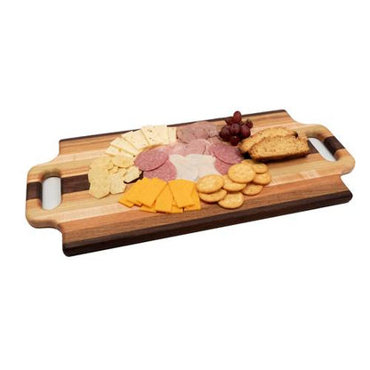 Wooden charcuterie board with assorted meats, cheeses, and crackers on a white background
