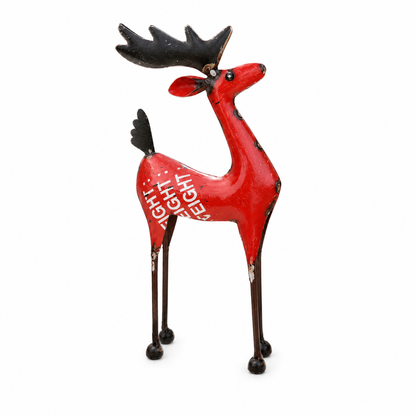 Red reindeer figurine with black antlers on a white background
