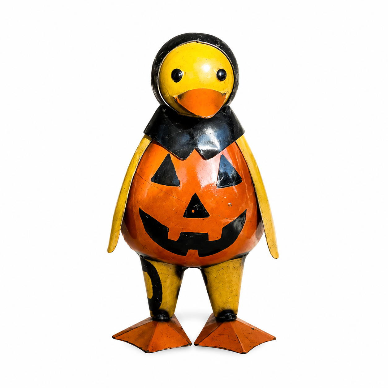 Pumpkin-shaped duck figurine with a jack-o'-lantern face on a white background
