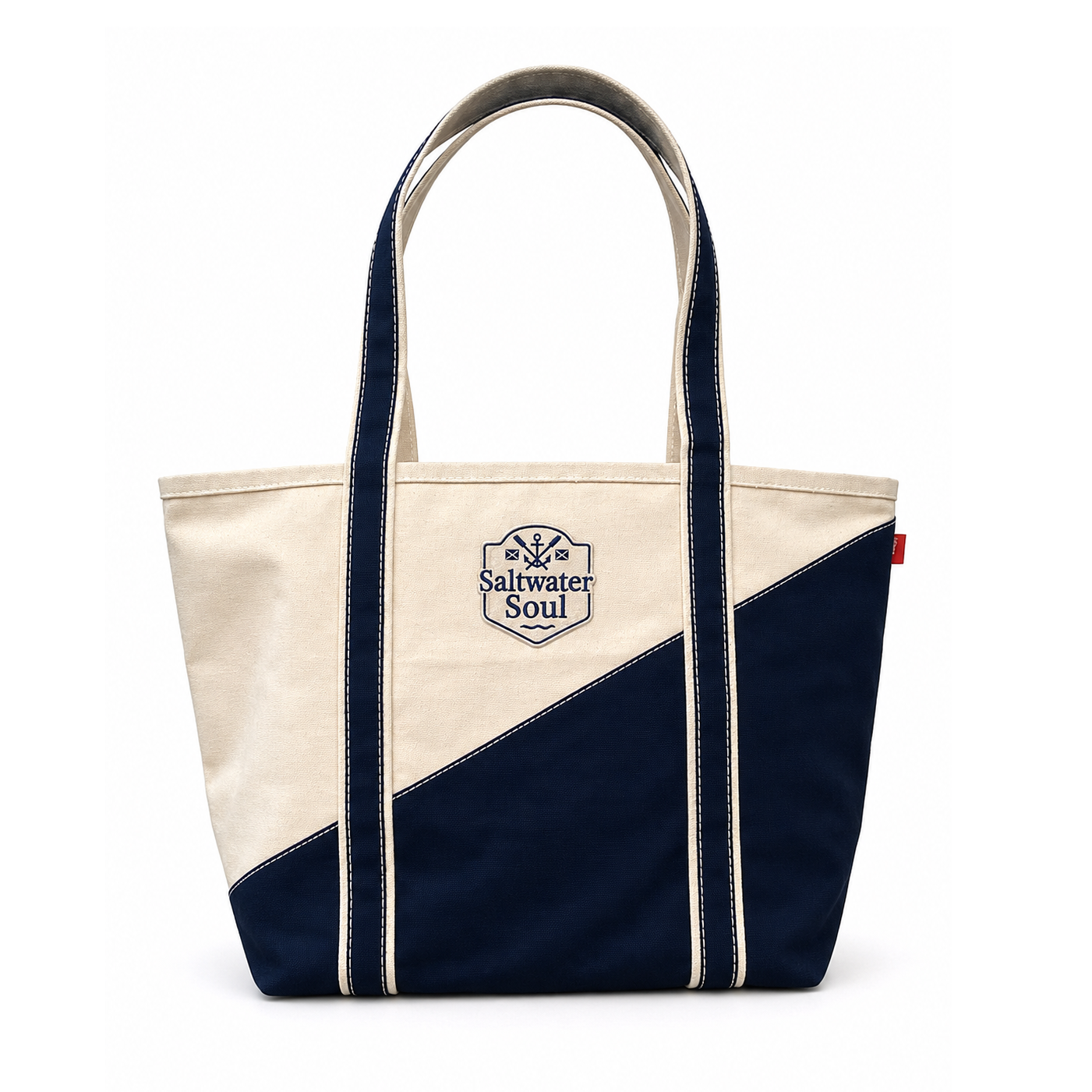 Navy and beige tote bag with 'Saltwater Soul' logo on a white background