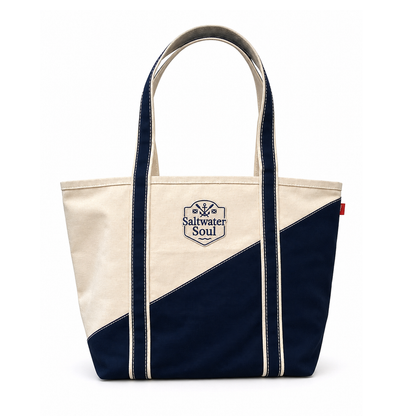 Navy and beige tote bag with 'Saltwater Soul' logo on a white background