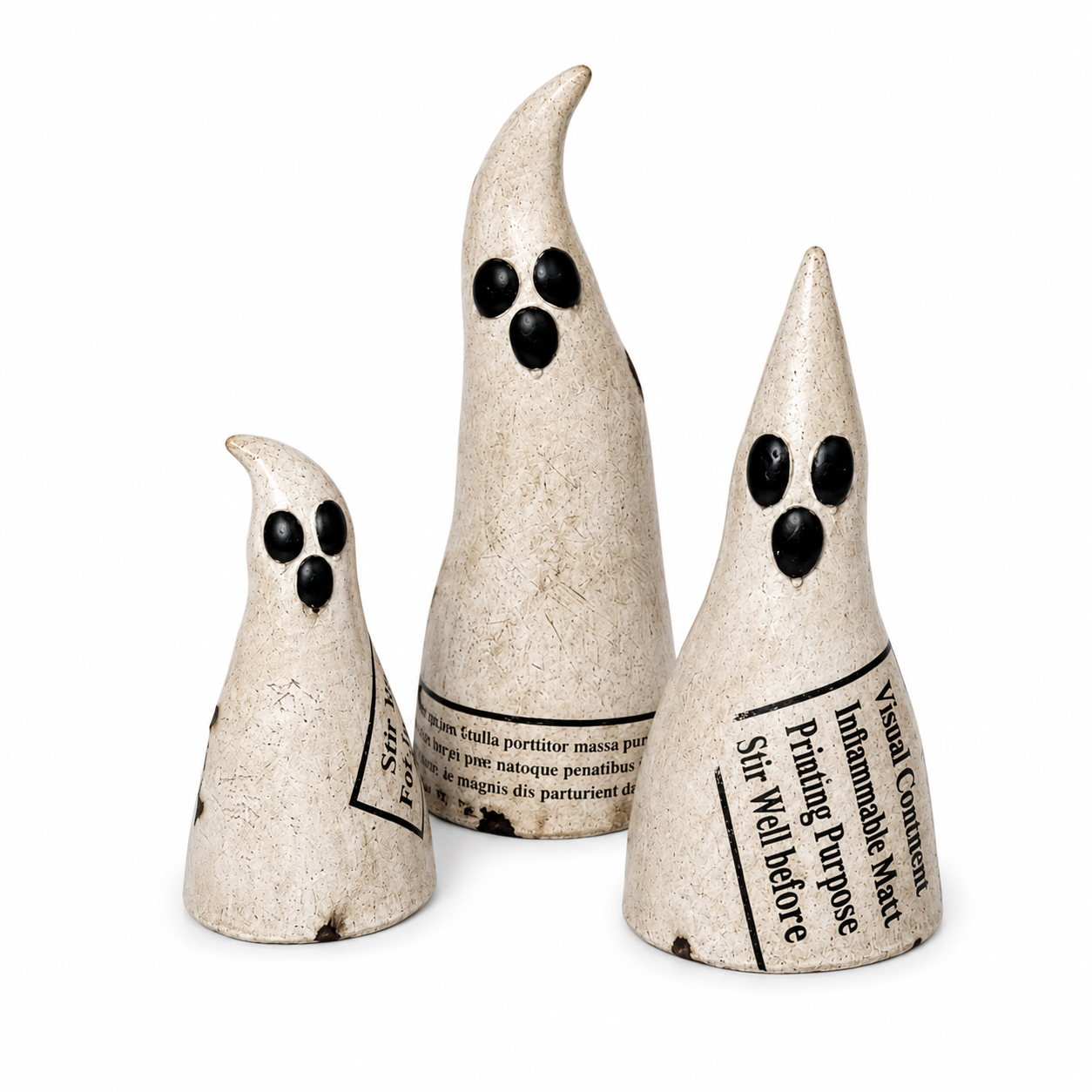 Three ghost-shaped decorative items on a white background
