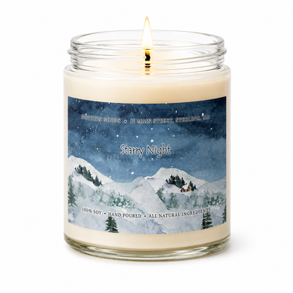 Clear jar candle with white wax and a decorative label on a white background.