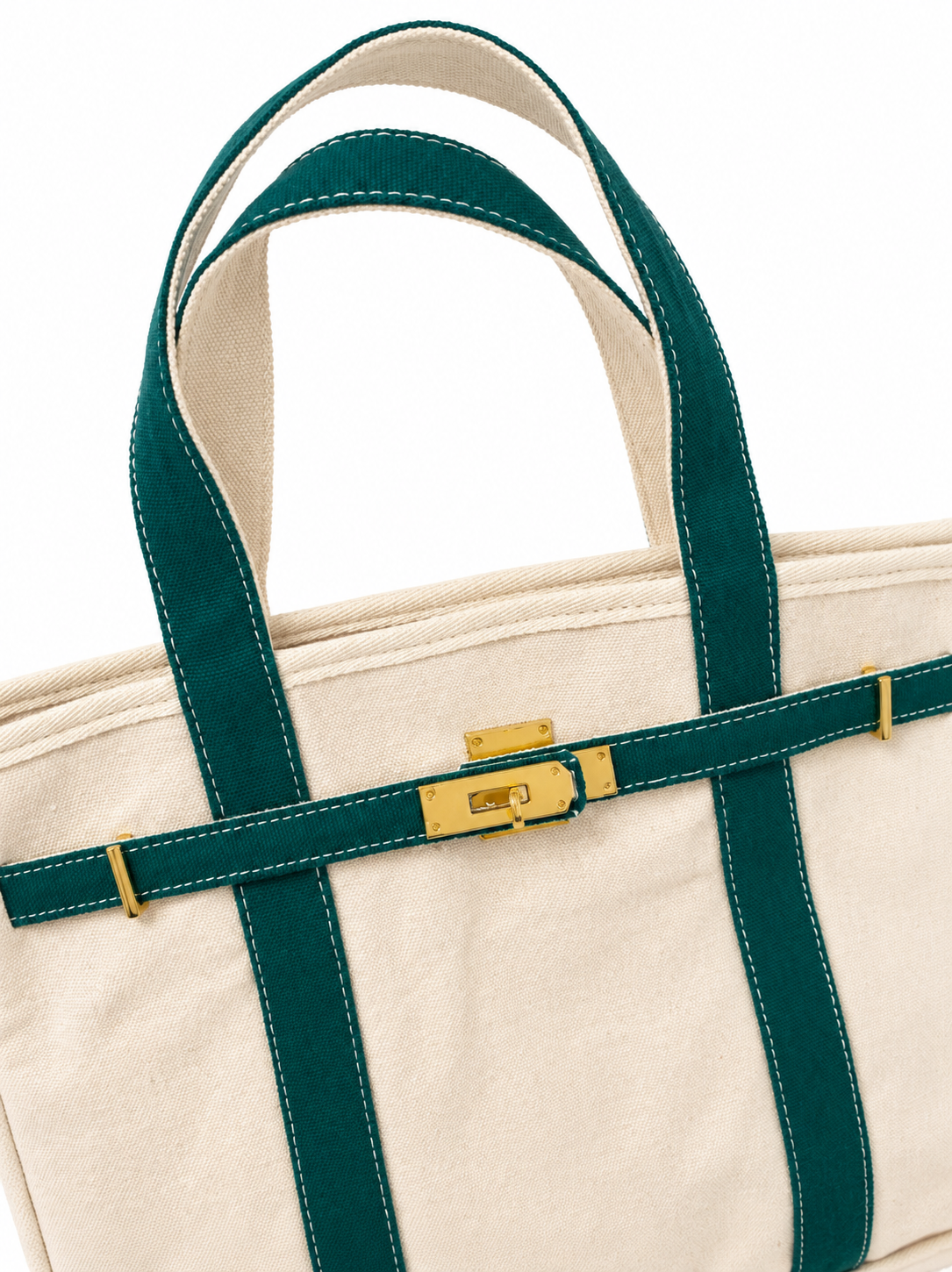 Beige tote bag with green straps and gold clasp on a white background