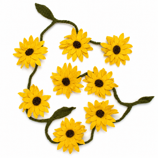 A felt sunflower garland with yellow petals, dark brown centers, and dark green stems and leaves, arranged on a plain white background.
