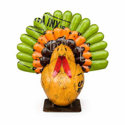 Decorative multicolored metal turkey on a white background.