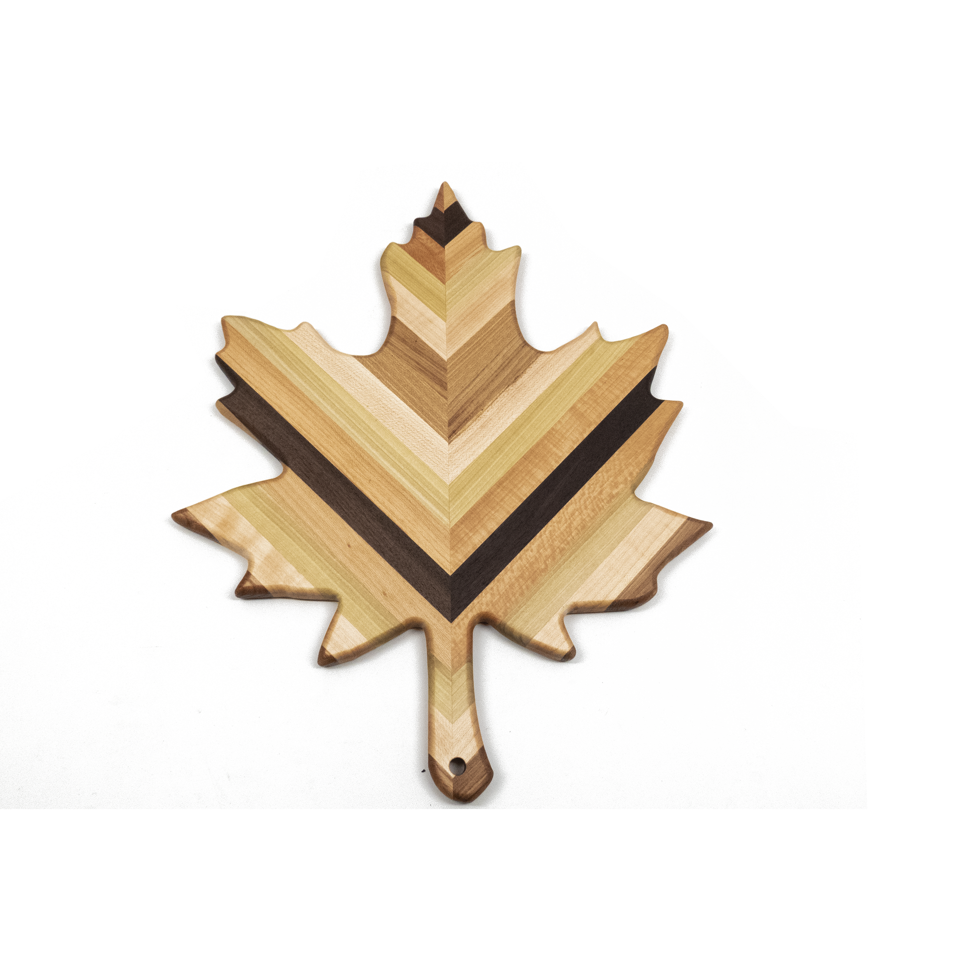 Wooden cutting board shaped like a maple leaf on a white background