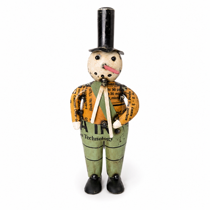 Vintage-style snowman figure with a top hat and suspenders on a white background