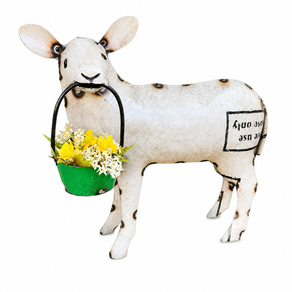 Decorative sheep figurine holding a basket of flowers on a white background