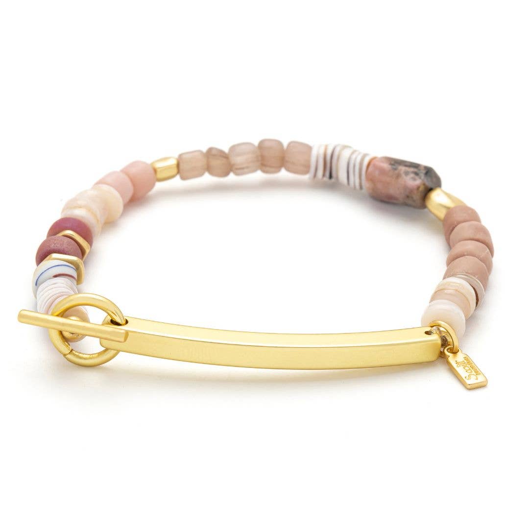 Bracelet with multicolored beads and gold clasp on a white background
