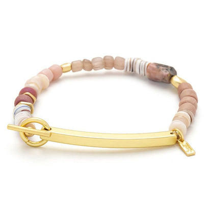 Bracelet with multicolored beads and gold clasp on a white background