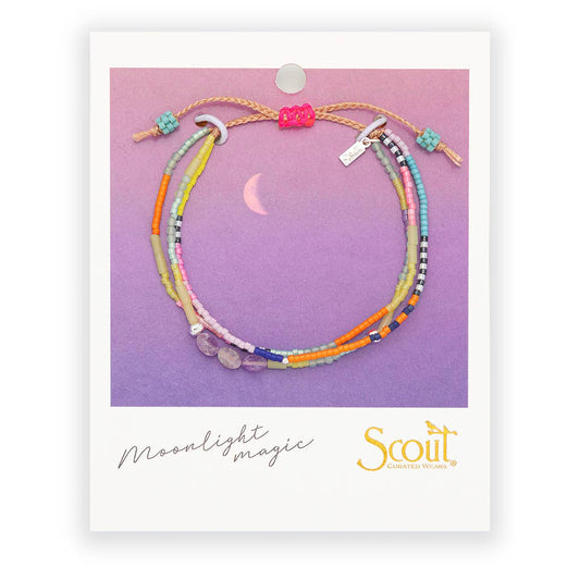 Beaded bracelet with multiple strands on a 'Moonlight Magic' Scout branded card.