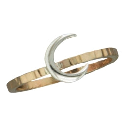 Ring with a crescent moon design on a white background