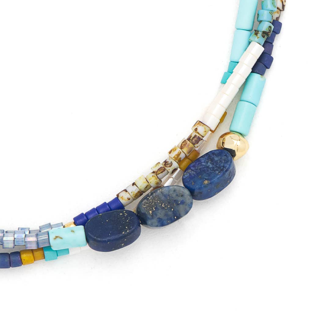 Multicolored beaded bracelet on a white background