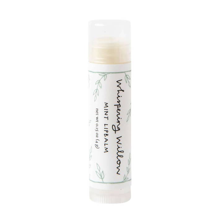 Lip balm with 'Whispering Willow' branding on a white background