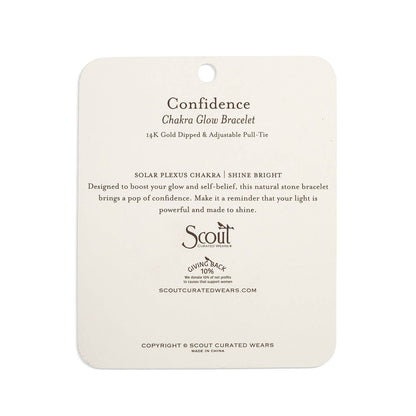 Confidence Charkra Glow Bracelet packaging back side on a white background.