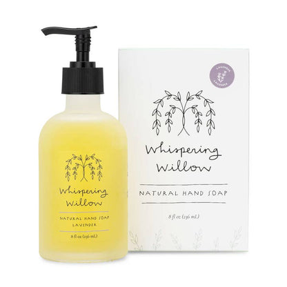 Bottle of 'Whispering Willow' natural hand soap with pump and packaging on a white background