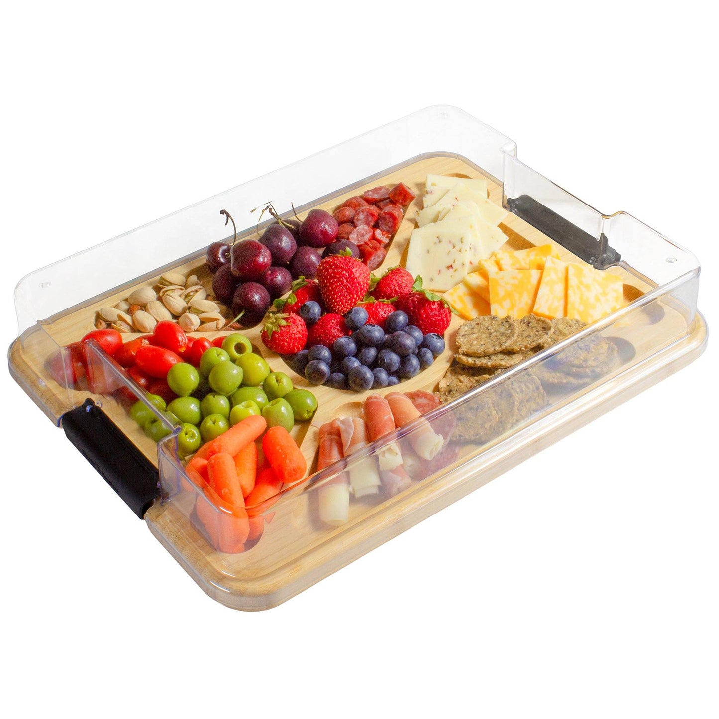 Clear plastic lid on top of serving board with food items including fruits, vegetables, and cheese.