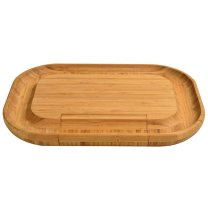 Wooden charcuterie board with a sunken rim on a white background