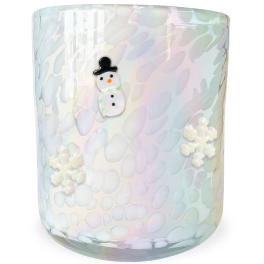 Iridescent glass candle with a snowman decoration on a white background