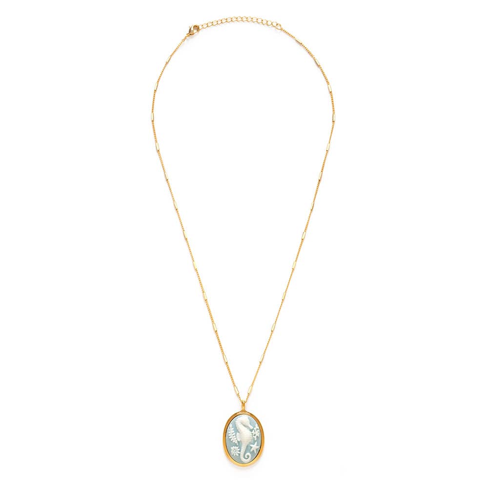 Gold necklace with a pendant on a white background