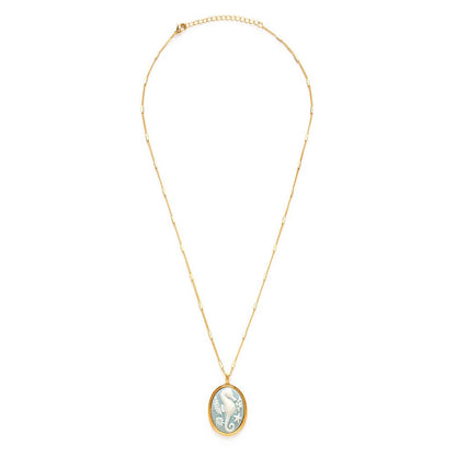 Gold necklace with a pendant on a white background