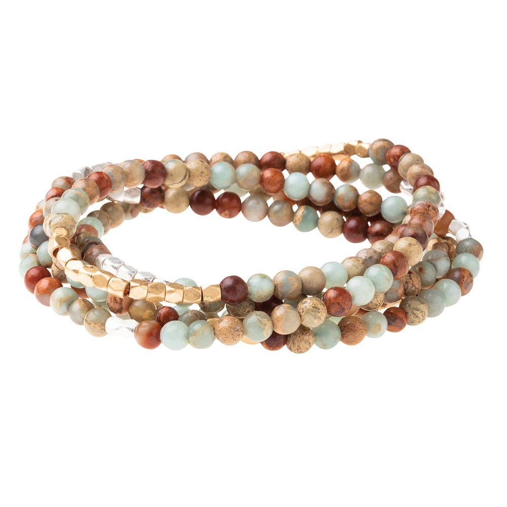 Convertible beaded necklace/wrap bracelet on a white background