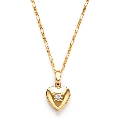 Gold heart-shaped pendant necklace on a white background