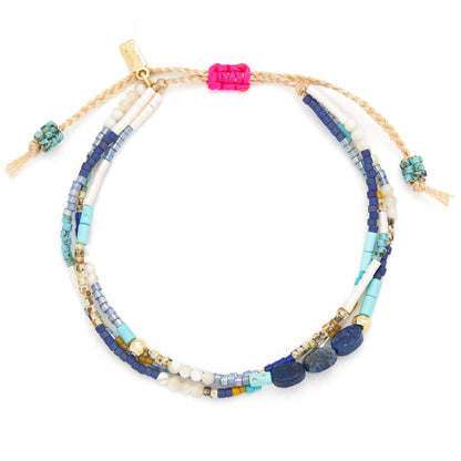 Multistrand beaded bracelet with colorful beads on a white background