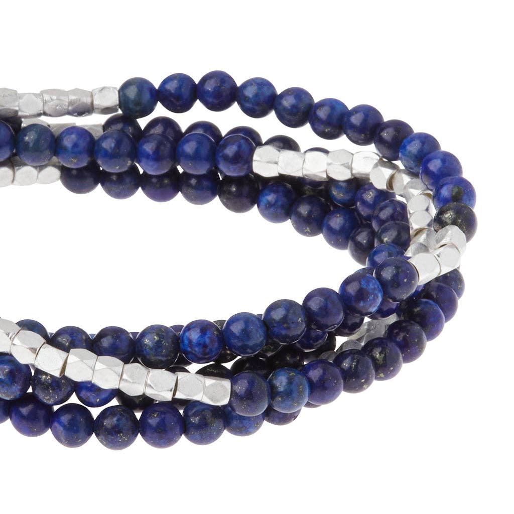 Convertible beaded necklace/wrap bracelet with silver accents on a white background