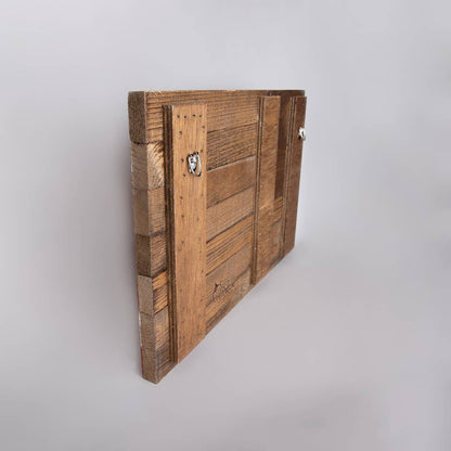 Wooden sign with a rustic design on a light gray background