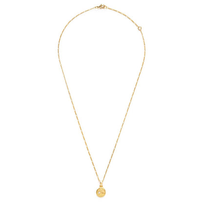 Gold necklace with a small pendant on a white background