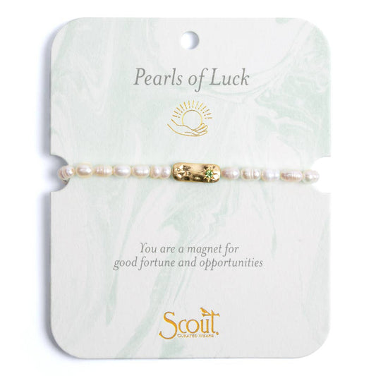 Pearls of Luck bracelet on a Scout branded card with text and logo.