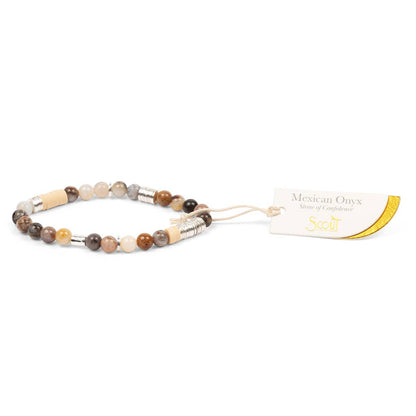 Beaded bracelet with a tag on a white background
