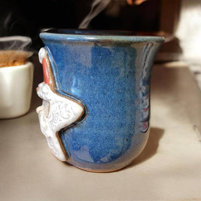 Blue ceramic mug on a table