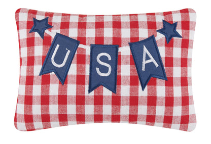 Pillow with red and white checkered pattern, blue stars, and 'USA' text on a white background