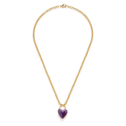 Gold necklace with a heart-shaped purple pendant on a white background