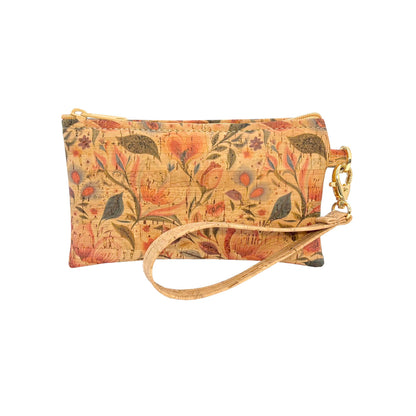 A small rectangular clutch or wristlet bag with a floral and botanical print on a warm beige background, featuring a matching wrist strap and gold-tone hardware.