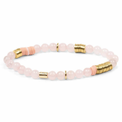 Bracelet with pink beads and gold accents on a white background