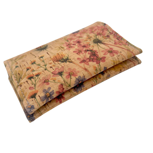 Floral patterned cork wallet on a white background