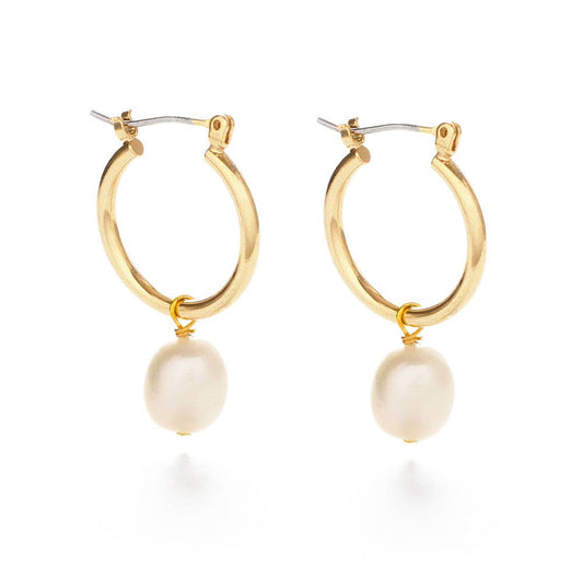 Gold hoop earrings with pearl drops on a white background