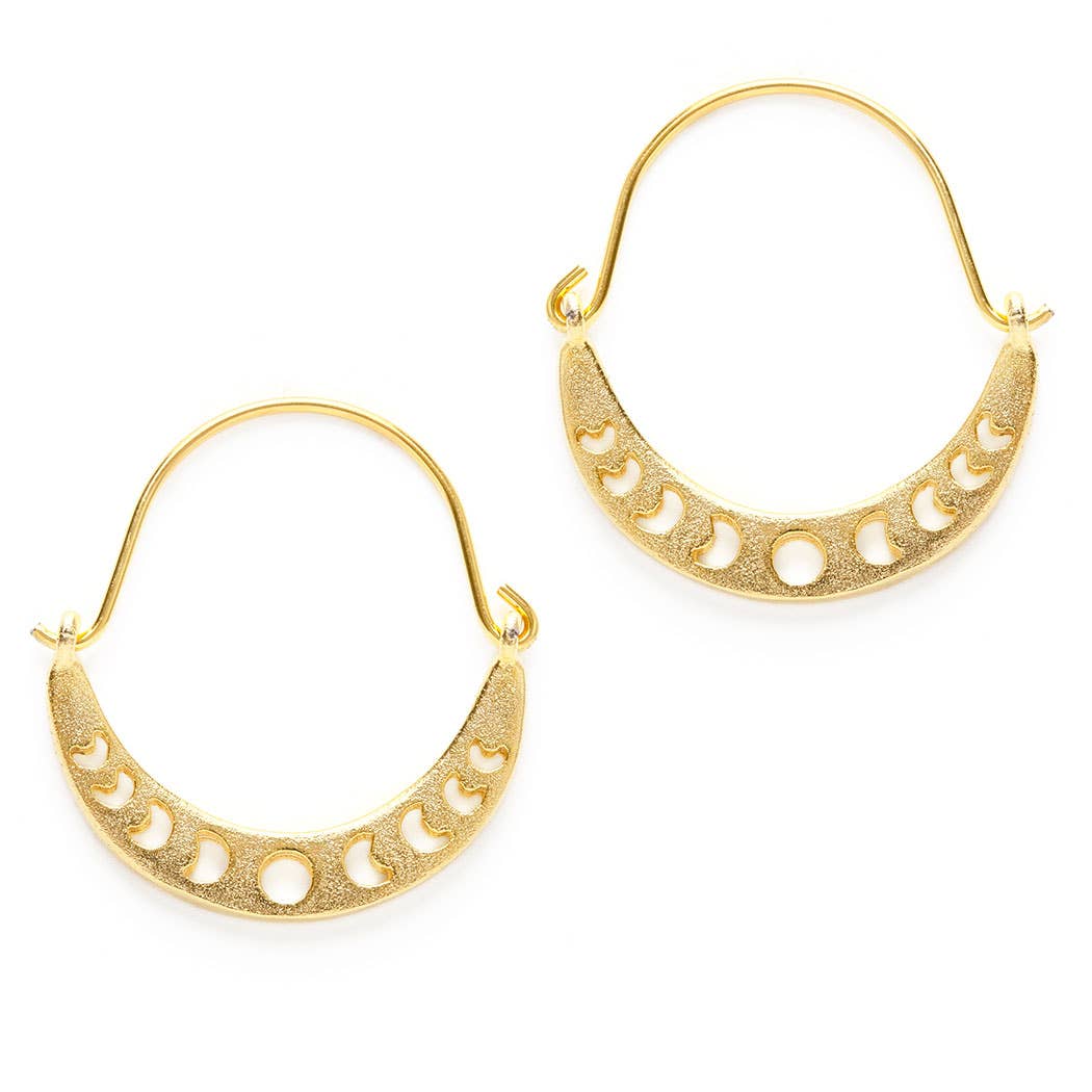 Gold hoop earrings with a cutout design on a white background