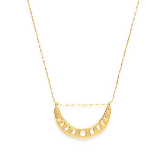 Gold necklace with a half-circle pendant on a white background