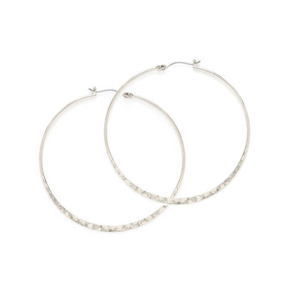 Pair of silver hoop earrings on a white background