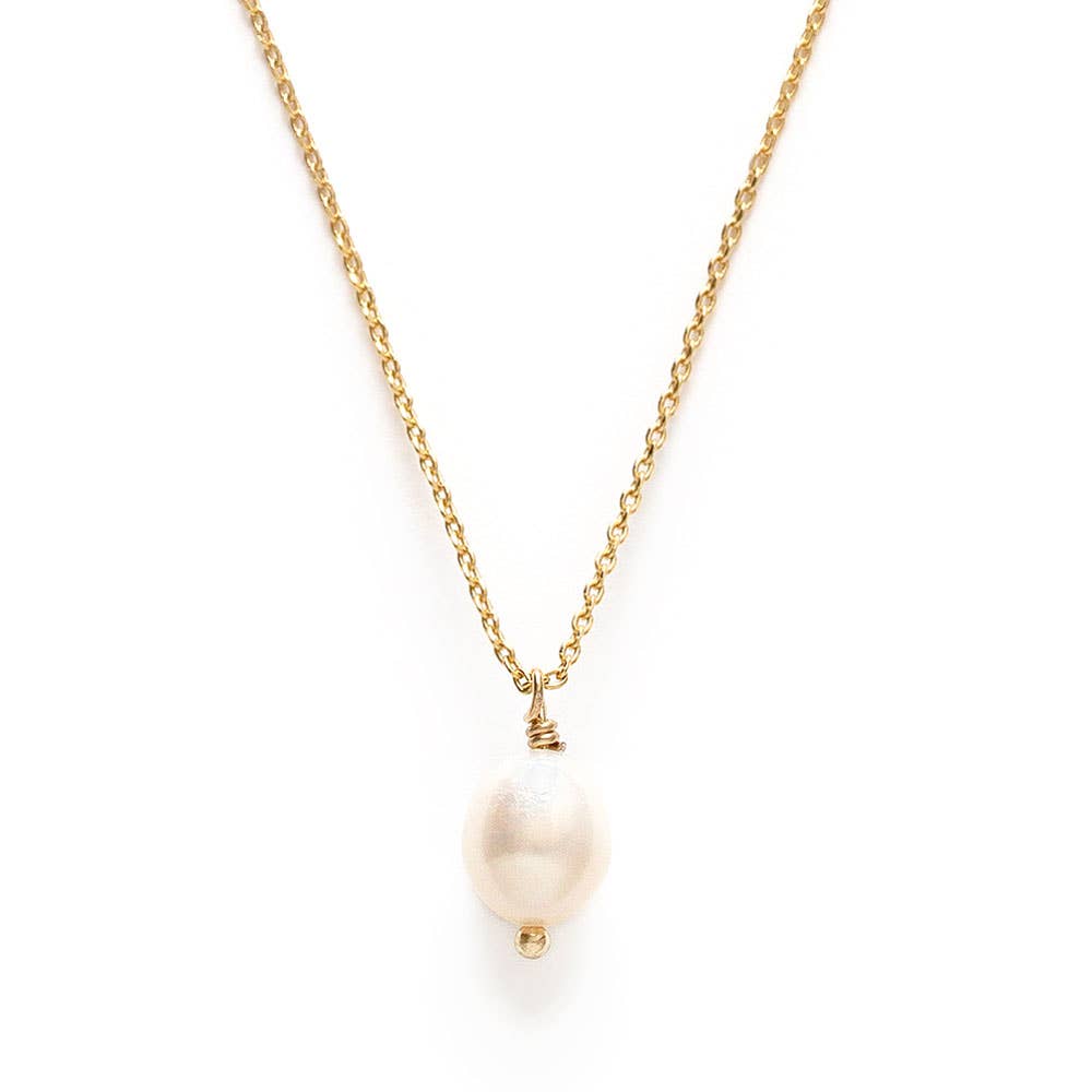 Gold necklace with a single pearl pendant on a white background