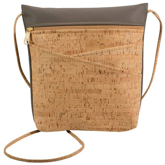 A gray and cork cross body bag with an adjustable strap and zipper closure, featuring two exterior crisscross pockets.