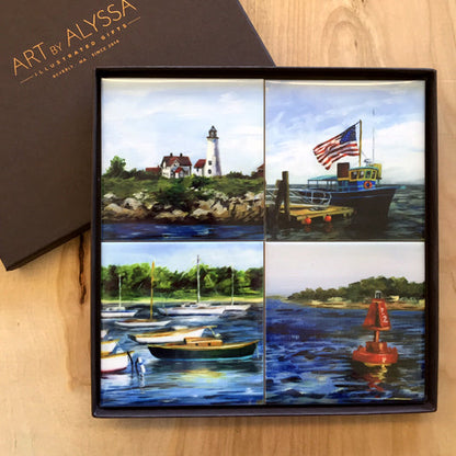 A set of four ceramic tile coasters with nautical-themed images, displayed in a presentation box with the Art by Alyssa logo.