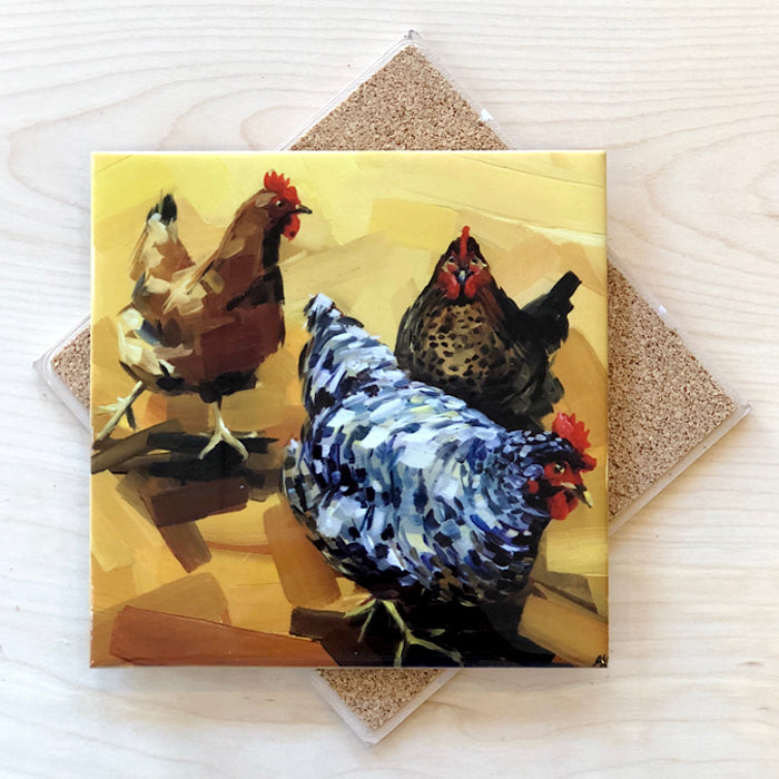 A 6-inch square tile trivet with an image of three chickens, mounted on cork backing.