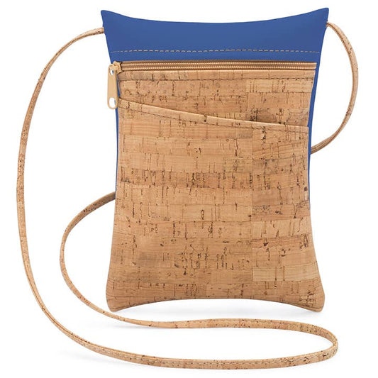 A royal blue cork mini cross body bag with an adjustable cork cord strap and a front pocket. The bag features a zipper closure.
